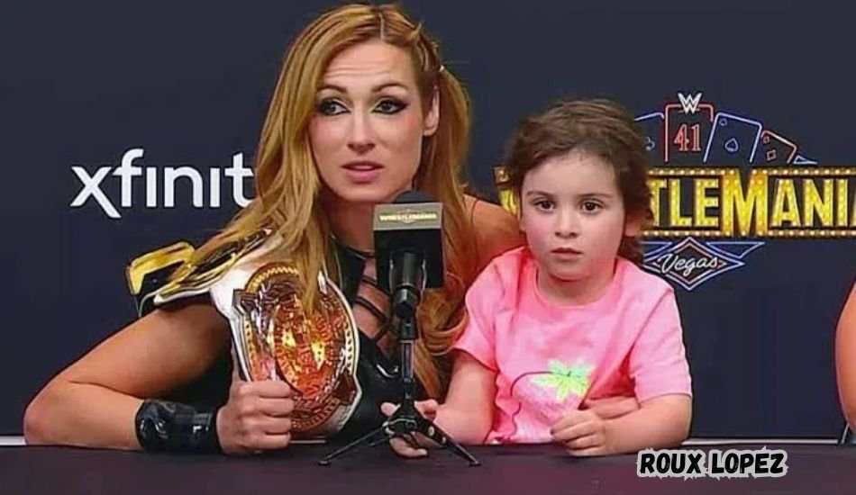 Roux Lopez smiling with parents Becky Lynch and Seth Rollins