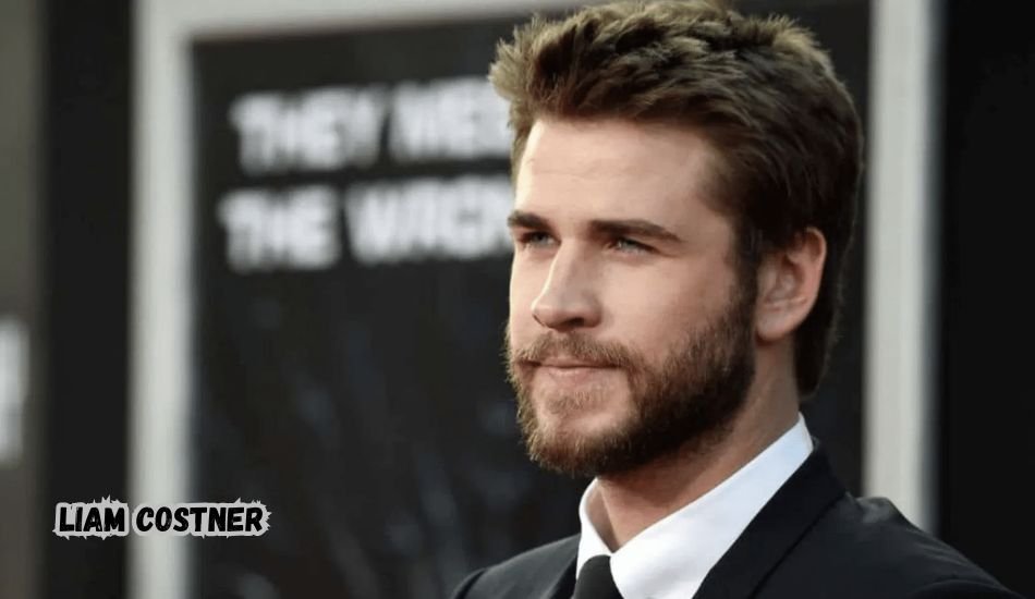 Liam Costner smiling during a film premiere event.