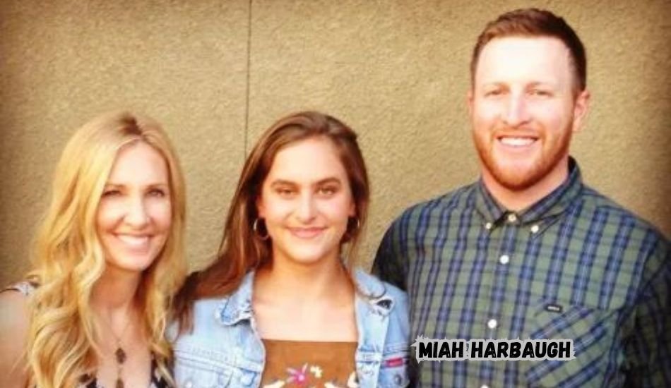 Miah Harbaugh smiling outdoors with casual attire