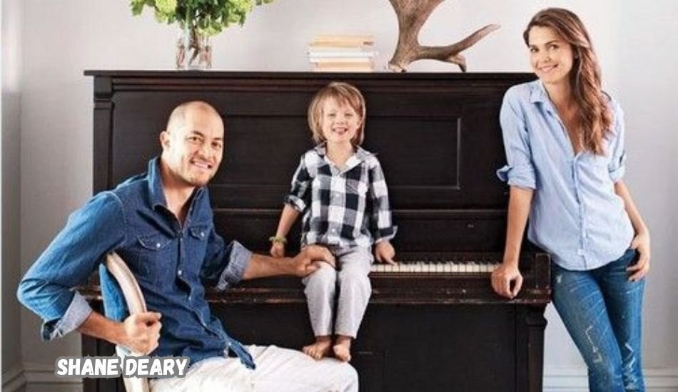 Shane Deary standing in a rustic wood workshop